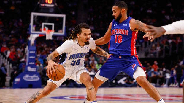 Oct 30, 2021; Detroit, Michigan, USA; Orlando Magic guard Cole Anthony (50) dribbles on Detroit Pistons guard Cory Joseph (18) in the second half at Little Caesars Arena. Mandatory Credit: Rick Osentoski-USA TODAY Sports